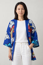 Red Dragon Kimono Cardigan 'Shinmon' – blue version of the red dragon kimono cardigan with clouds and torii, front view on model
