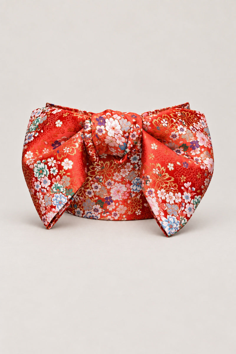 Red Obi Belt 'Hanagoyomi' – red brocade obi with cherry blossom and chrysanthemums, wide pre-tied brocade obi belt with sewn bow for women's kimono or yukata, studio view