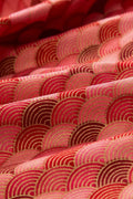 Red Seigaiha Furoshiki 'Akanami' – furoshiki printed with seigaiha wave pattern in reds and pink outlined in gold, Japanese furoshiki wrapping cloth 50 by 145 cm, close-up of the print