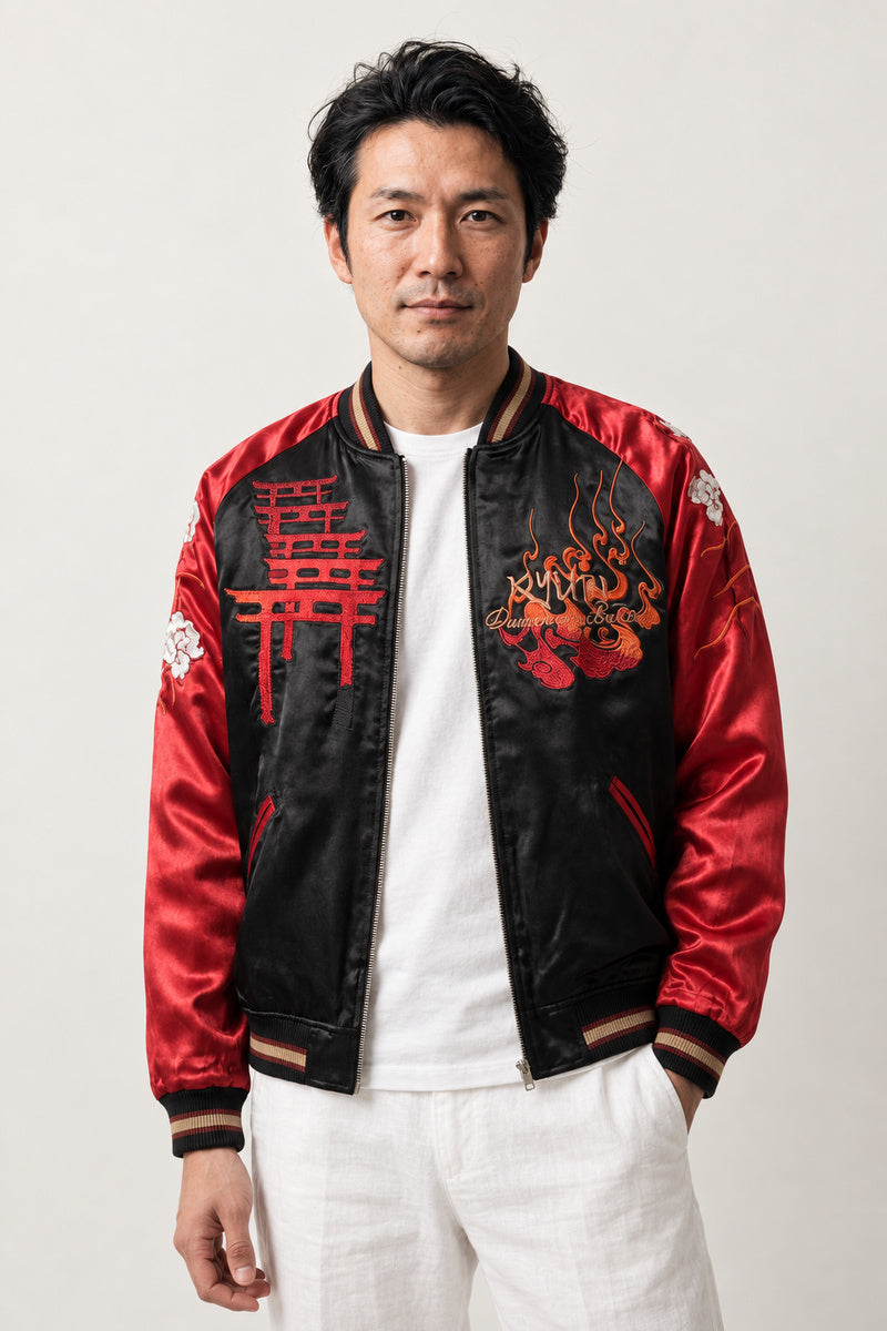Red Torii Yokai Sukajan 'Hyakki' – black and red sukajan with embroidered red torii gate and yokai, Japanese sukajan souvenir bomber jacket, front view on model