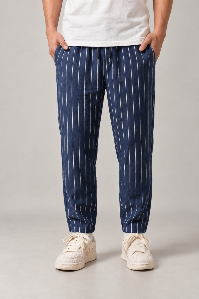 Relaxed Pinstripe Trousers 'Hosojima' – navy pinstripe relaxed trousers, front view on model