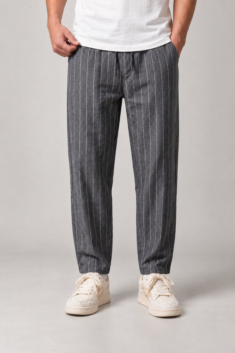 Relaxed Pinstripe Trousers 'Hosojima' – grey pinstripe relaxed trousers, front view on model