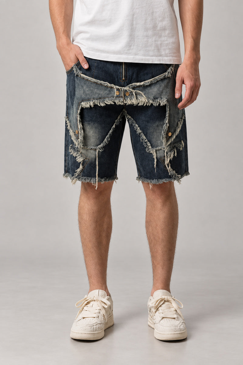 Ripped and Patched Denim Shorts 'Yabure' – dark blue ripped and patched denim shorts with frayed star panels, Japanese streetwear shorts, front view on model