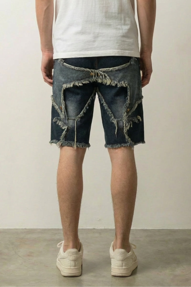 Ripped and Patched Denim Shorts 'Yabure' – back view on model, studio