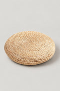Round Tatami Floor Cushion 'Igusa' – pale natural rush straw round floor cushion woven in a coil, Japanese tatami seat cushion 30 cm, studio view