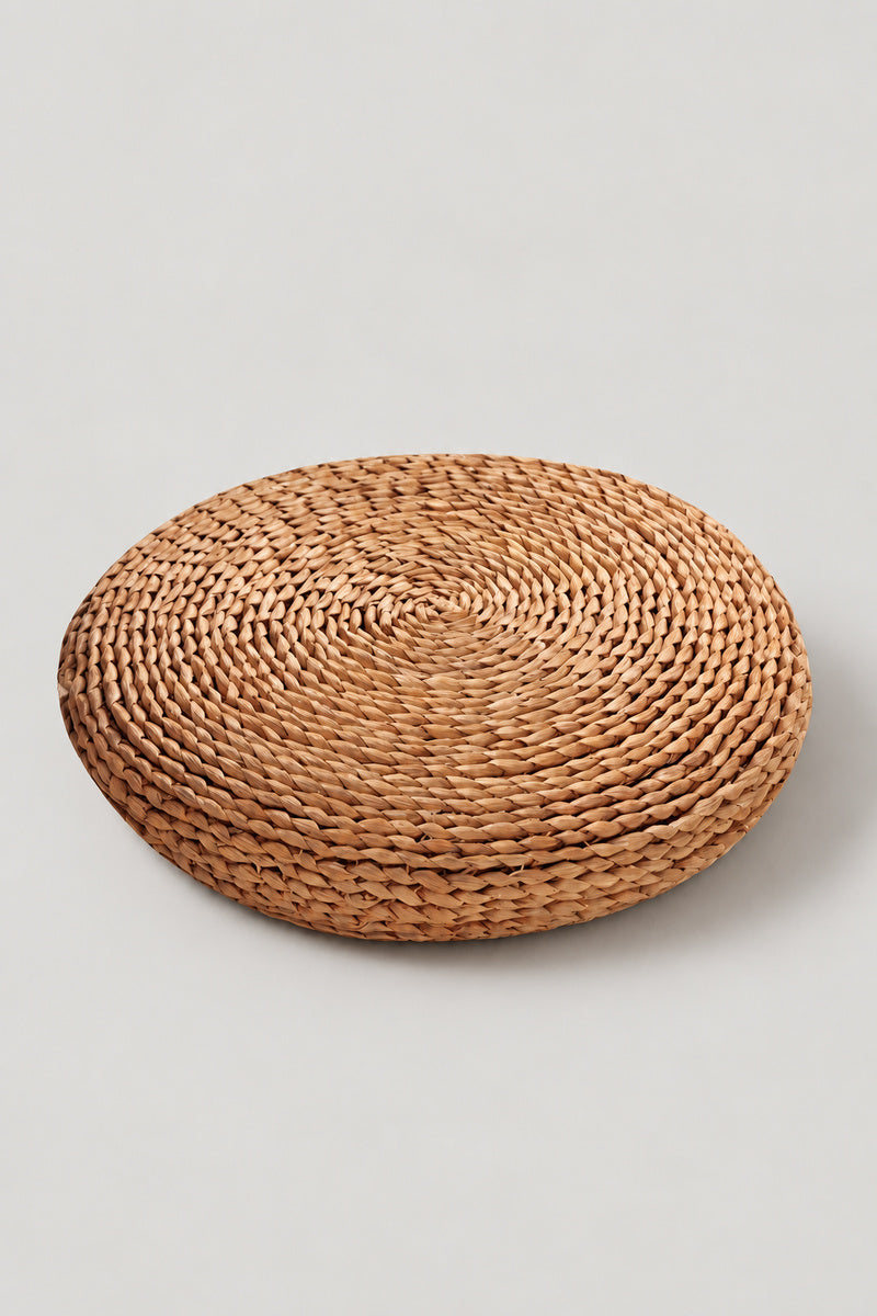 Round Tatami Floor Cushion 'Igusa' – dark toasted rush straw round floor cushion woven in a coil, Japanese tatami seat cushion 30 cm, studio view