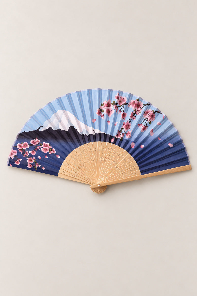 Sakura Mount Fuji Fan 'Aofuji' – folding fan printed with cherry blossom branches over blue Mount Fuji and pale sky, Japanese folding sensu fan with bamboo ribs, open, studio view