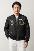 Samurai Streetwear Bomber Jacket 'Kinun' – black bomber jacket with embroidered samurai and dragon patches, Japanese streetwear, front view on model
