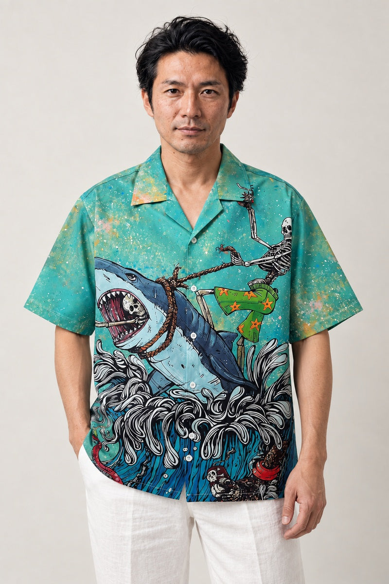 Shark and Skeleton Camp Shirt 'Gaikotsu' – teal short sleeve camp shirt with shark and skeleton print, Japanese streetwear camp collar shirt, front view on model