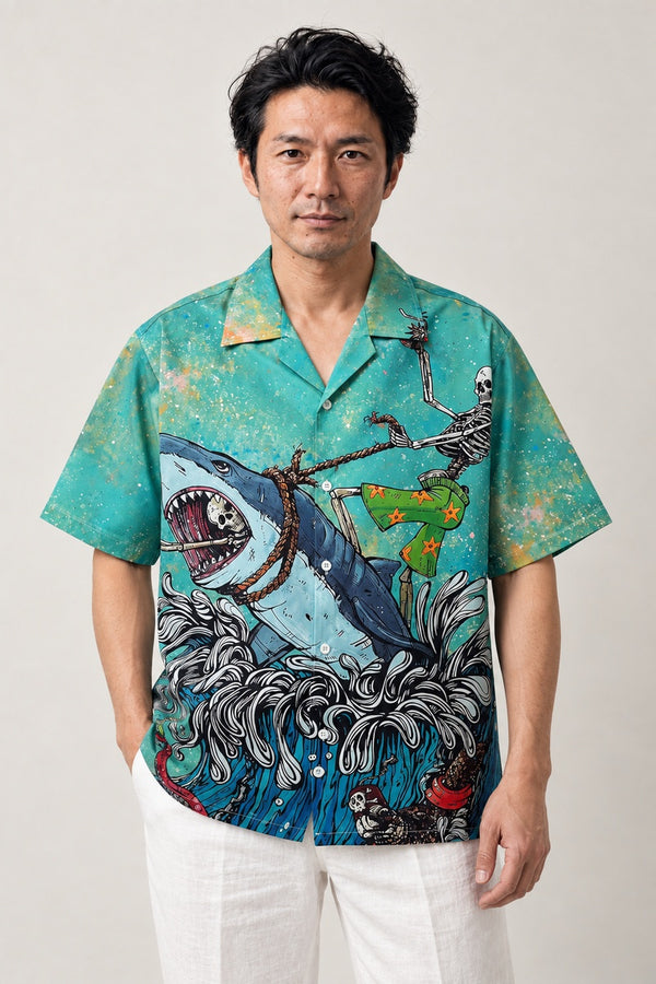 Shark and Skeleton Camp Shirt 'Gaikotsu' – teal short sleeve camp shirt with shark and skeleton print, Japanese streetwear camp collar shirt, front view on model