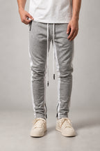 Side Stripe Track Pants 'Hashiri' – grey version of the side stripe track pants, front view on model