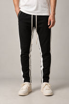 Side Stripe Track Pants 'Hashiri' – black side stripe track pants with white piping detail, front view on model