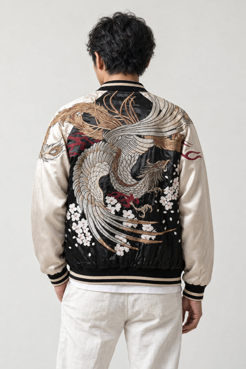 Silver Phoenix Sukajan 'Otori' – back view of black and cream sukajan showing the silver embroidered phoenix and blossom