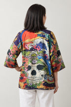 Skull and Peacock Kimono Jacket 'Mujo' – back view of kimono jacket showing the large skull and peacock print in vivid colours