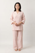 Soft Pink Wrap Top Pyjamas 'Awayuki' – soft pink women's pyjamas with wrap top and trousers, Japanese style gauze loungewear, front view on model