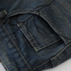 Spider Web Print Denim Shorts 'Kumonosu' – close-up detail of the dark washed denim rear pocket