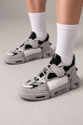 Strapped Utility Chunky Sneakers 'Yoroi' – grey and black version of the strapped chunky sneakers, Japanese streetwear sneakers worn with white socks, on model