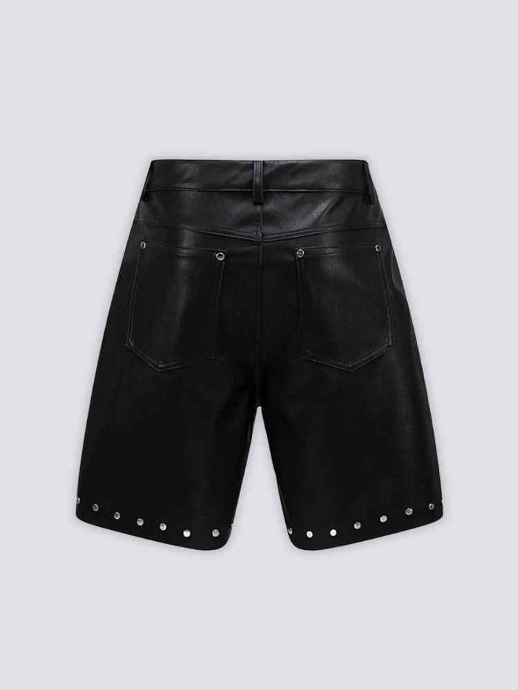 Studded Faux Leather Shorts 'Byo' – flat lay back view of the black studded faux leather shorts