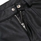 Studded Faux Leather Shorts 'Byo' – close-up detail of the button fly and zip