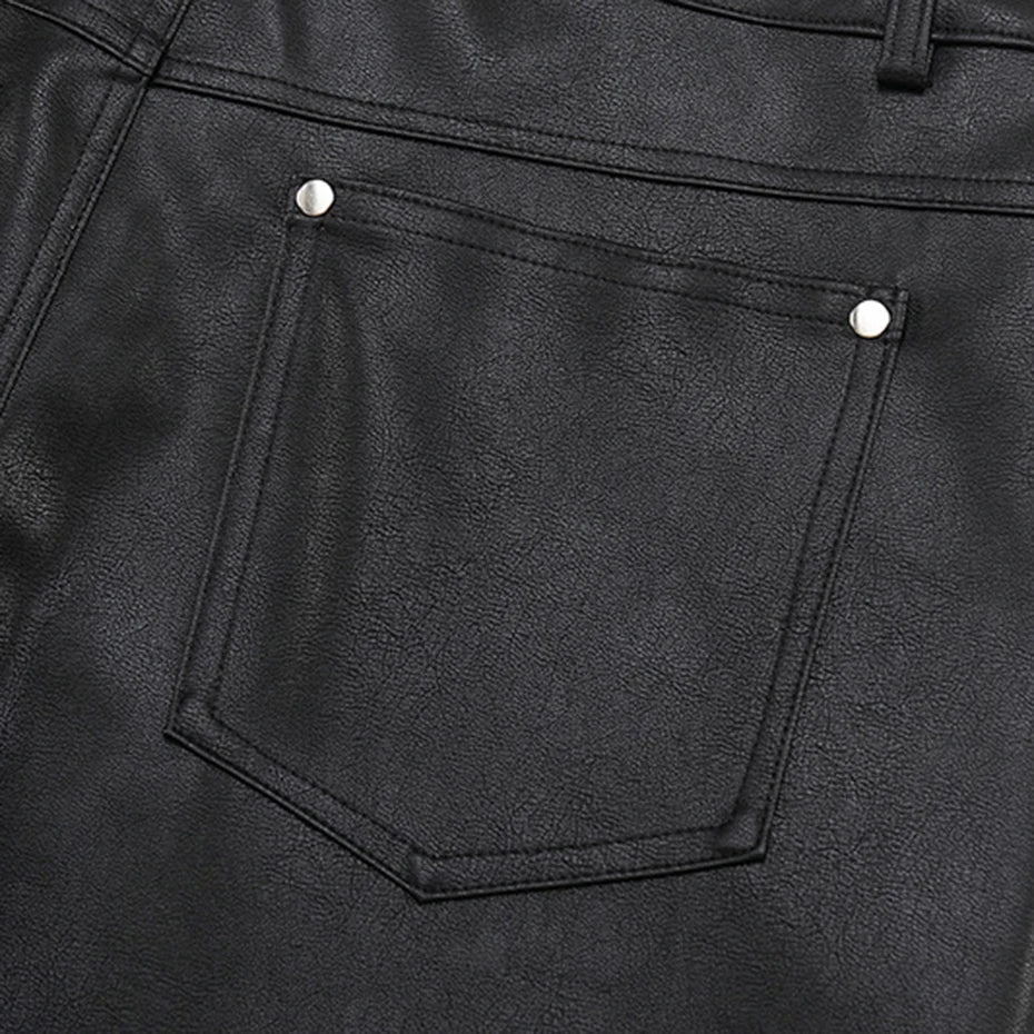 Studded Faux Leather Shorts 'Byo' – close-up detail of the rear pocket with stud