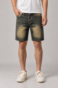 Sun Faded Denim Shorts 'Hizarashi' – sun faded blue denim shorts with sepia wash, Japanese streetwear shorts, front view on model