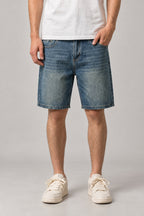Sun Faded Denim Shorts 'Hizarashi' – back view of the sun faded blue denim shorts, on model