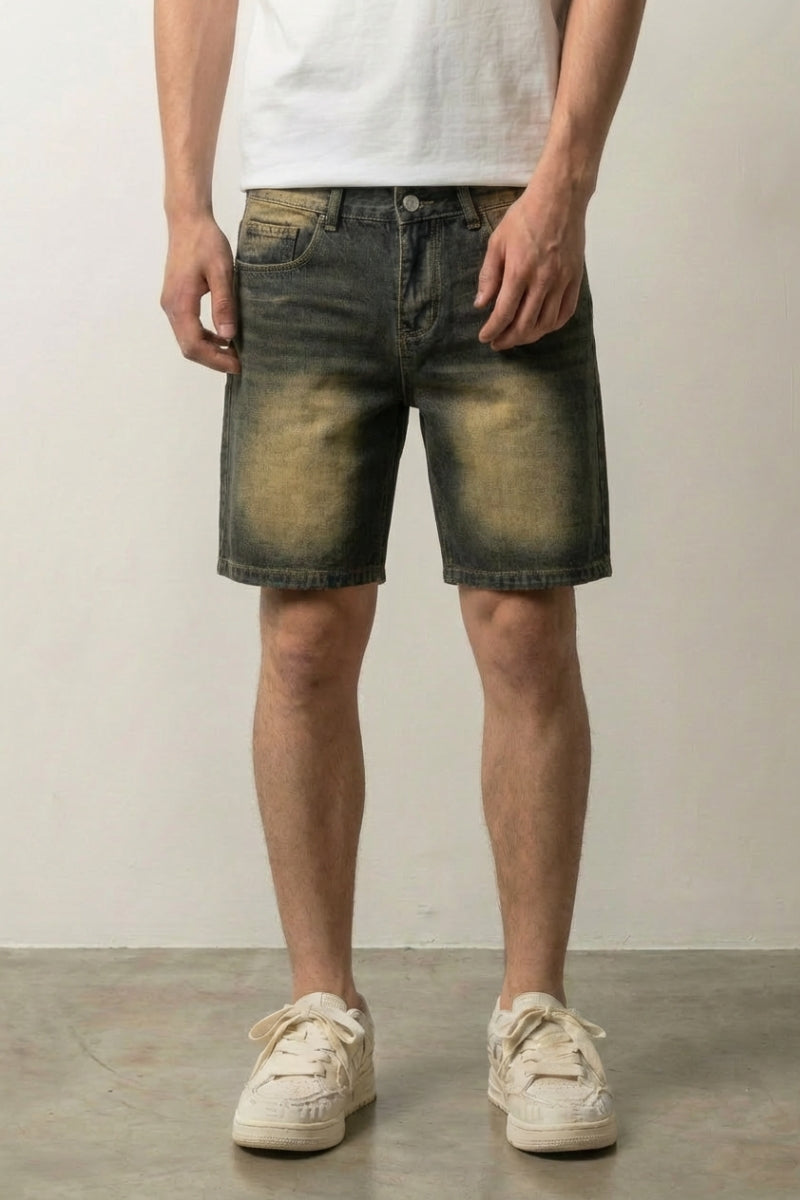 Sun Faded Denim Shorts 'Hizarashi' – sun faded blue denim shorts with sepia wash, front view on model, studio