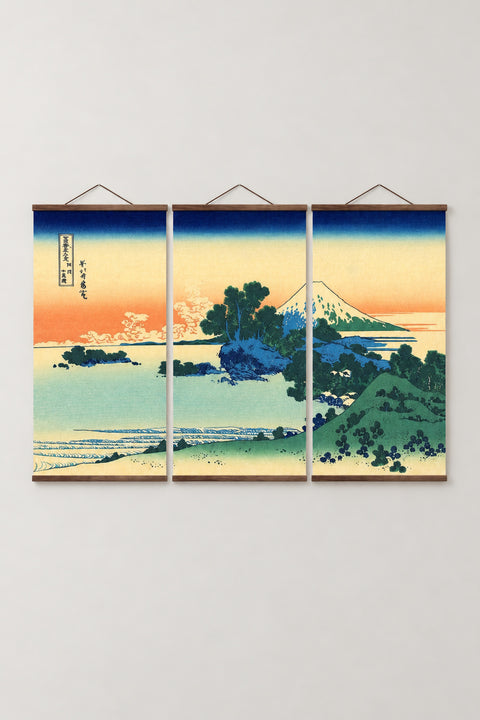 Sunset Coast Fuji Triptych 'Yuhi' – Shichirigahama in Sagami Province, pine coast at sunset with Fuji from Hokusai's Thirty-six Views of Mount Fuji, three-panel triptych on wooden hanging rails, Japanese wall art, studio view
