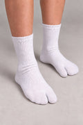 Tabi Socks – white ribbed tabi socks with split toe, Japanese socks for geta and sandals, front view on model