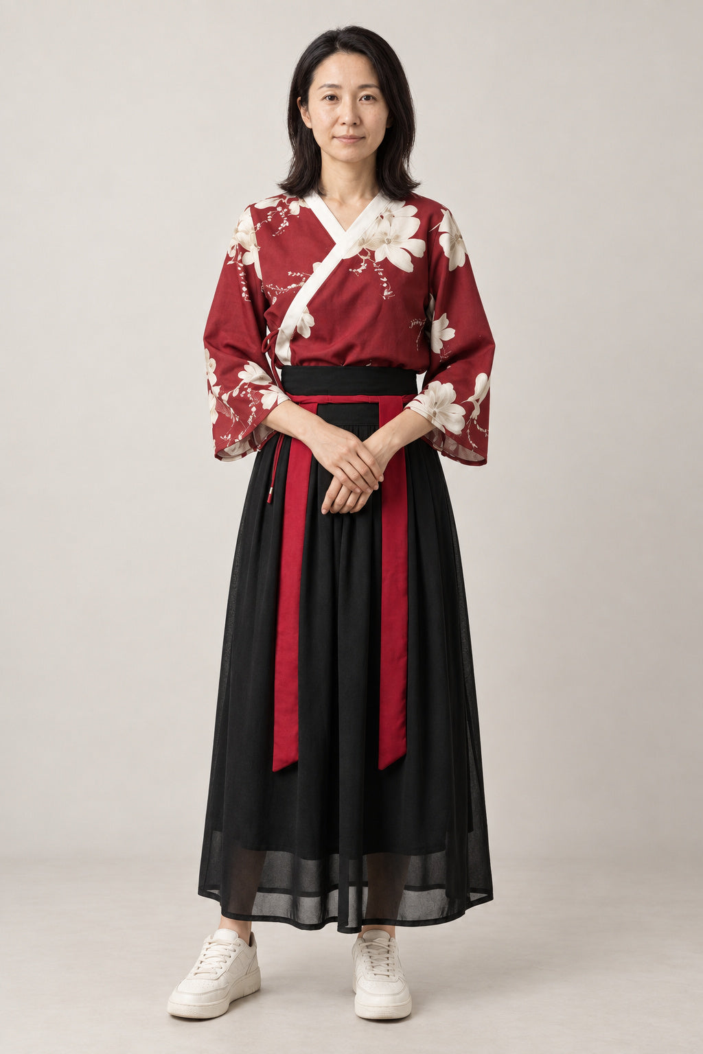 Taisho Roman Kimono Skirt Set 'Ebicha' – burgundy red kimono top with white floral print and black pleated maxi skirt, Taisho roman style Japanese dress set, front view on model