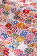 Temari Rabbit Furoshiki 'Usagimari' – red furoshiki printed with patterned temari thread balls and white rabbits, Japanese furoshiki wrapping cloth 50 by 145 cm, close-up of the print