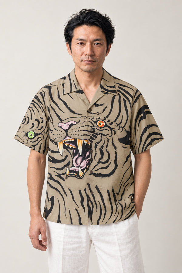 Tiger Face Print Shirt 'Torashima' – beige short sleeve shirt with large tiger face and stripe print, Japanese streetwear camp collar shirt, front view on model