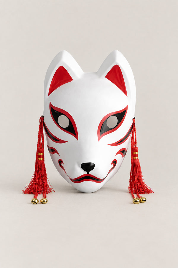 Traditional Fox Mask 'Shiragitsune' – white kitsune fox mask with red ears, red eye sweeps, red tassels and brass bells, classic, Japanese kitsune festival mask, studio view
