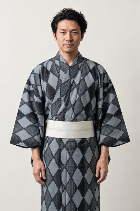 Traditional Japanese Kimono 'Hishimon' – grey and black diamond pattern men's kimono with cream obi belt, traditional Japanese yukata robe, front view on model