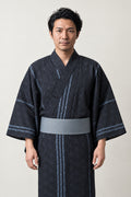 Traditional Men's Yukata 'Asanoha' – black men's yukata with fine striped pattern and grey obi belt, traditional Japanese kimono robe, front view on model