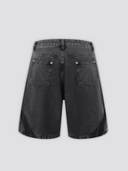 Two Tone Panelled Denim Shorts 'Hagi' – flat lay back view of the black two tone panelled denim shorts
