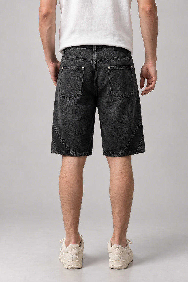 Two Tone Panelled Denim Shorts 'Hagi' – back view of the black two tone panelled denim shorts on model