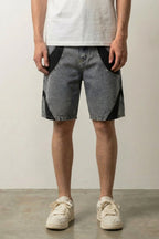 Two Tone Panelled Denim Shorts 'Hagi' – grey two tone panelled denim shorts, front view on model, studio