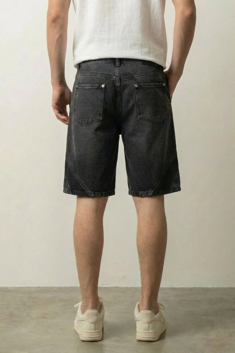 Two Tone Panelled Denim Shorts 'Hagi' – black two tone panelled denim shorts, back view on model, studio