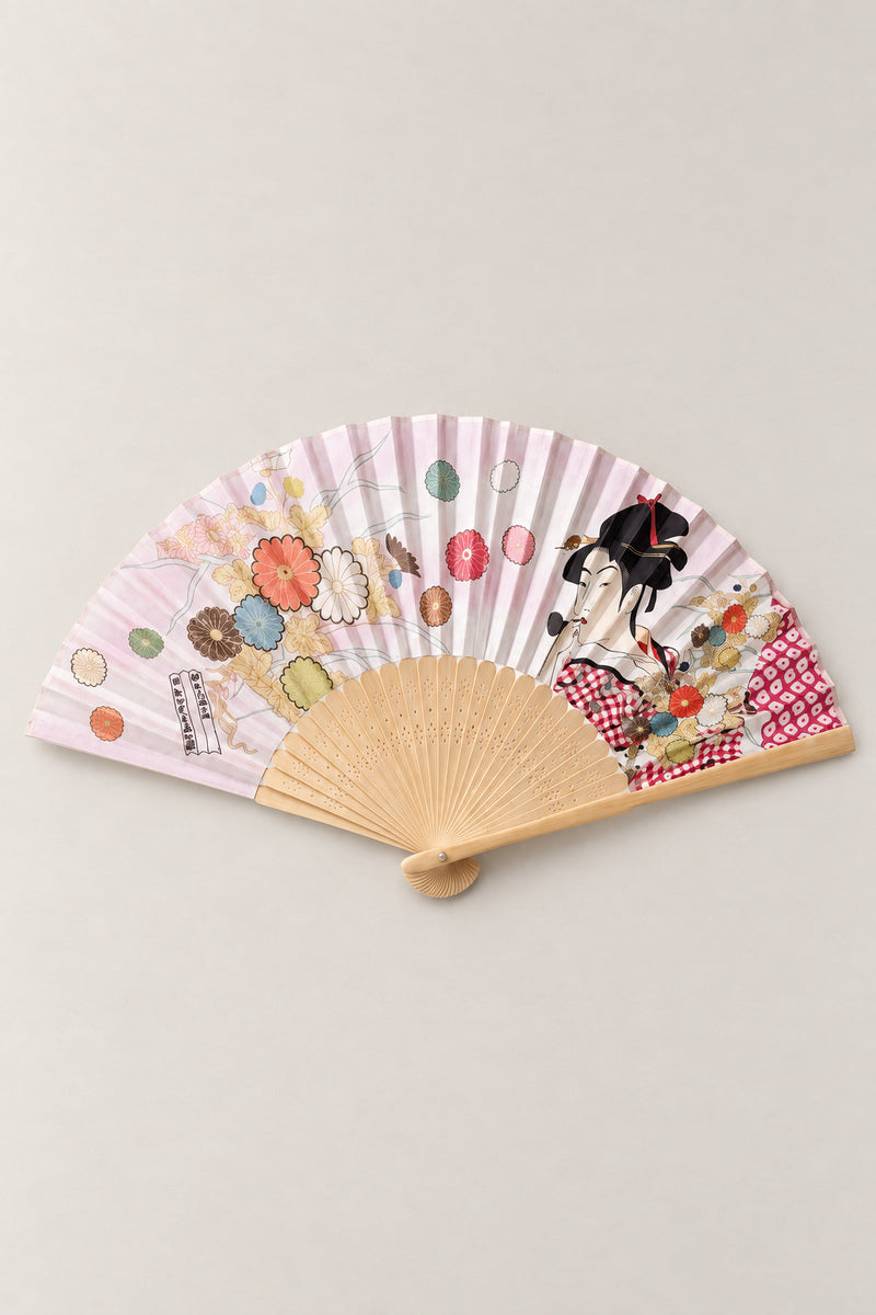 Ukiyo-e Geisha Fan 'Oiran' – folding fan printed with an ukiyo-e courtesan in pink kimono among balloons and flowers, Japanese folding sensu fan with bamboo ribs, open, studio view