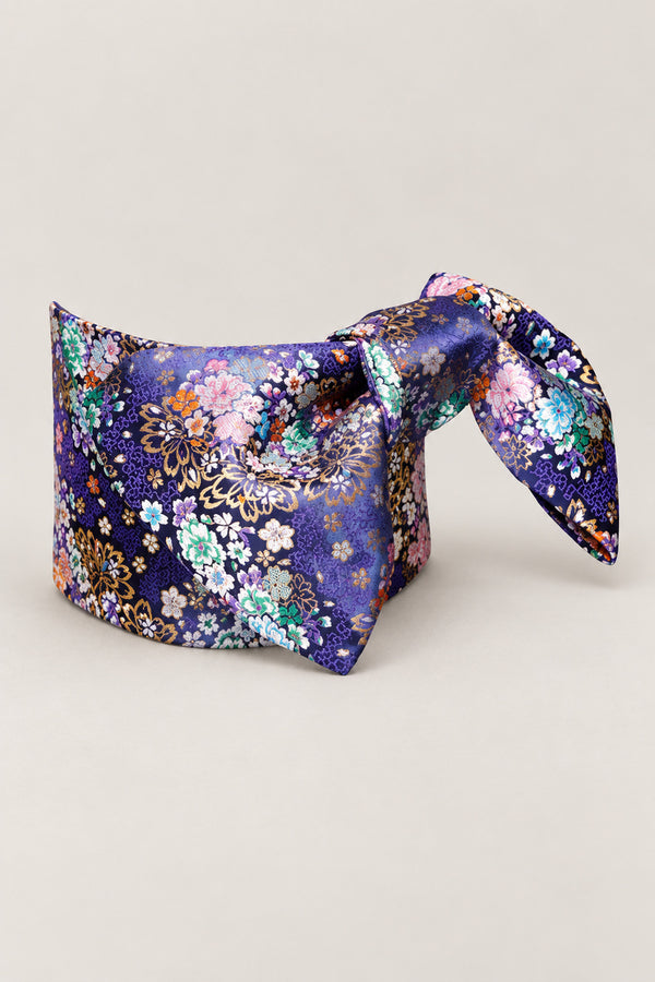 Violet Floral Obi Belt 'Murasakino' – violet purple brocade obi with pink, blue and white flowers, wide pre-tied brocade obi belt with sewn bow for women's kimono or yukata, studio view