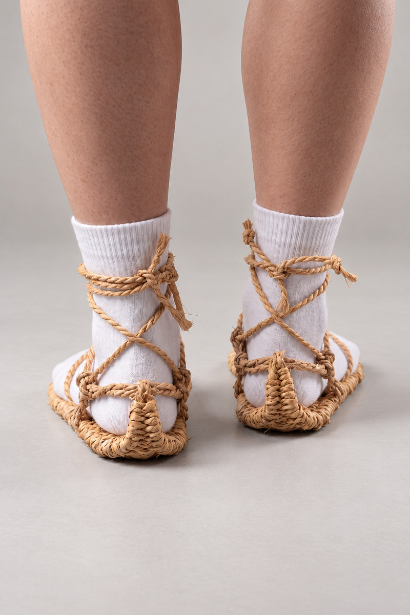 Waraji Sandals – waraji straw sandals worn over tabi socks, rear view on model