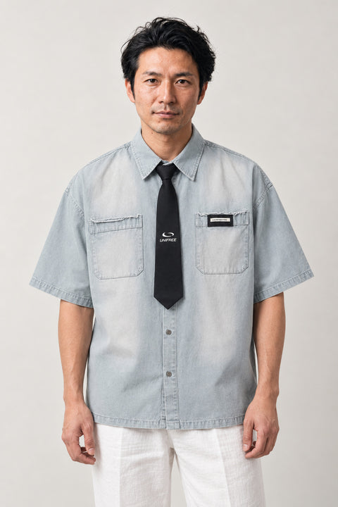 Washed Work Shirt and Tie Set 'Tsutome' – light blue washed short sleeve work shirt with black tie, Japanese streetwear uniform shirt, front view on model