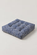 Wave Patchwork Chair Cushion 'Namiza' – square tufted chair cushion in a diagonal patchwork of blue Japanese wave prints, Japanese seat pad, studio view