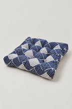 Wave Patchwork Chair Cushion 'Namiza' – square tufted chair cushion in a checkerboard patchwork of blue wave prints, Japanese seat pad, studio view