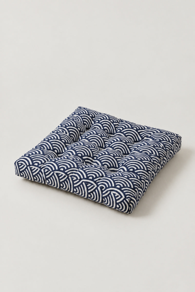 Wave Patchwork Chair Cushion 'Namiza' – square tufted chair cushion in a blue seigaiha scale print, Japanese seat pad, studio view