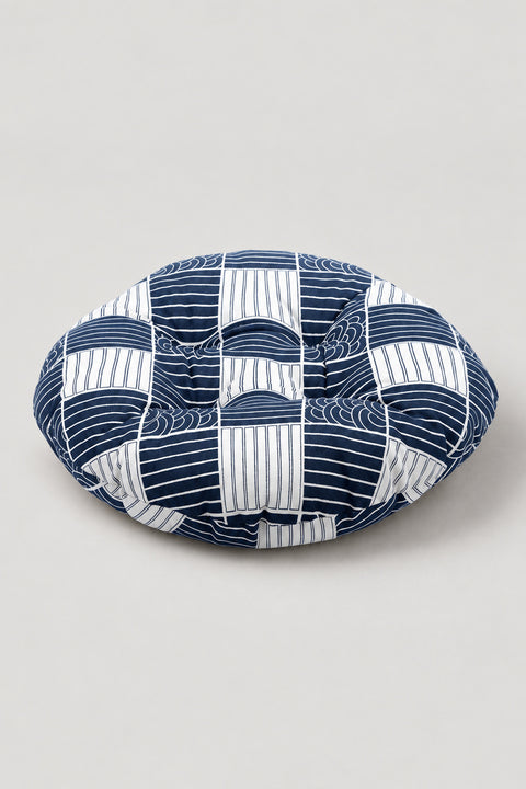 Wave Print Zabuton Floor Cushion 'Naminoza' – round floor cushion in a blue and white patchwork of stripes and scales, Japanese zabuton floor cushion, studio view