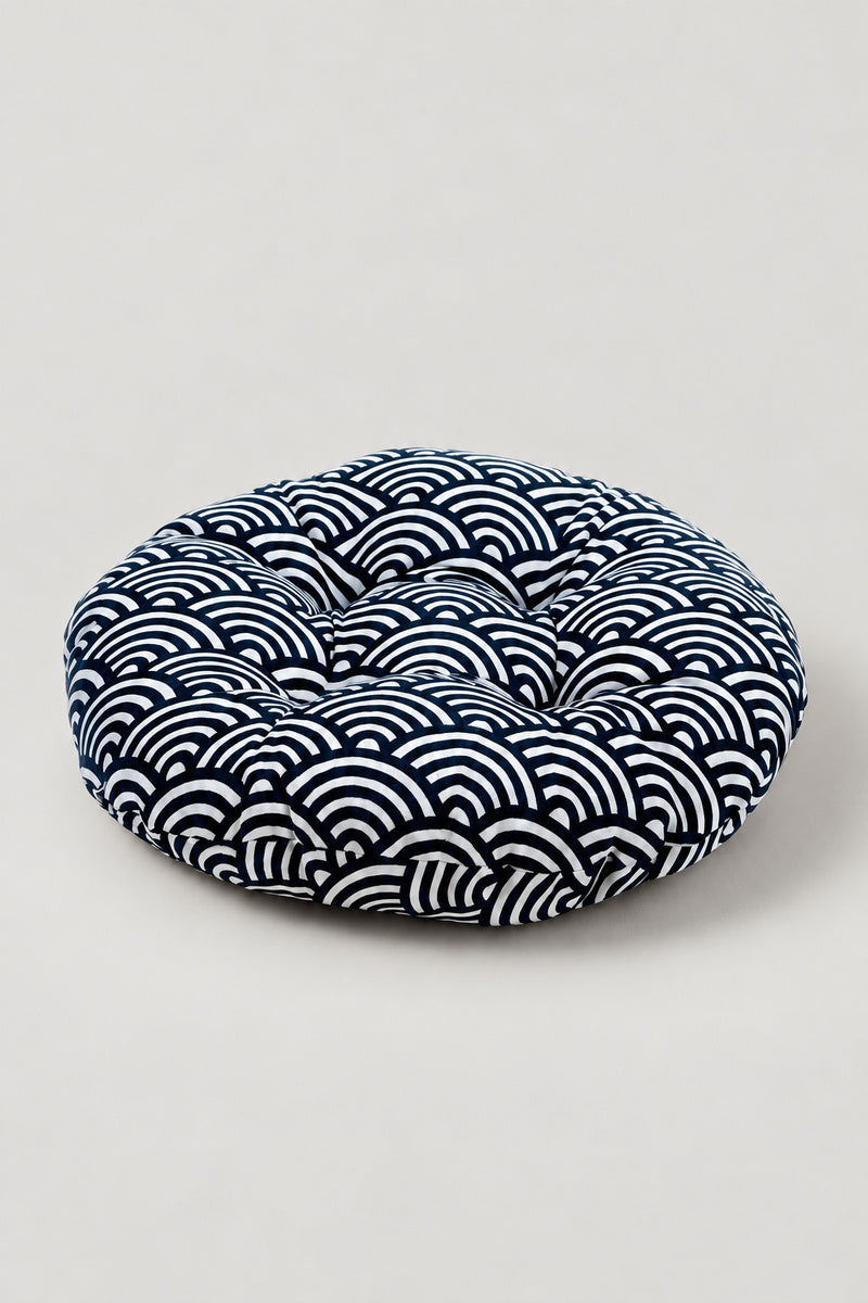Wave Print Zabuton Floor Cushion 'Naminoza' – round floor cushion in navy seigaiha wave print, Japanese zabuton floor cushion, studio view