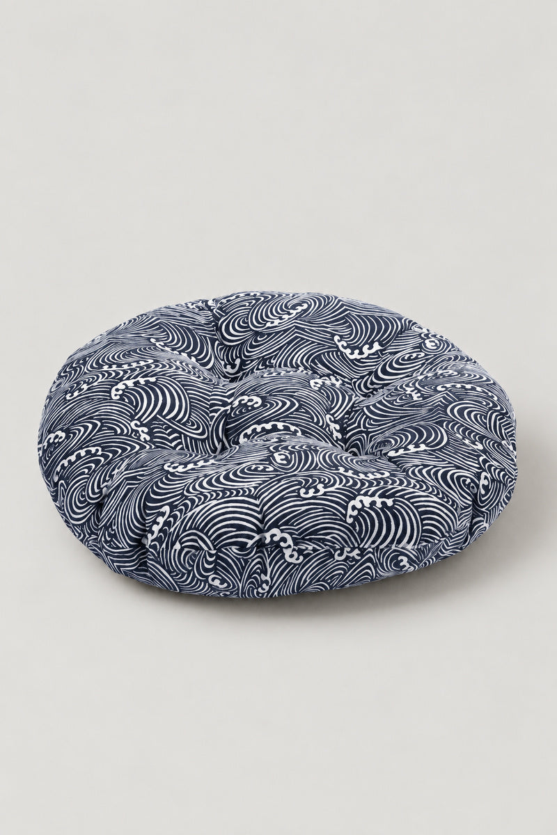 Wave Print Zabuton Floor Cushion 'Naminoza' – round floor cushion in blue flowing water print, Japanese zabuton floor cushion, studio view