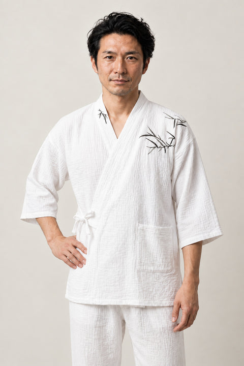 White Bamboo Japanese Pajamas 'Sasaba' – white jinbei pyjamas with bamboo embroidery, unisex two-piece Japanese jinbei set with side-tie top and shorts, front view on model